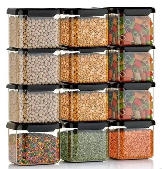 a stack of containers with different types of beans